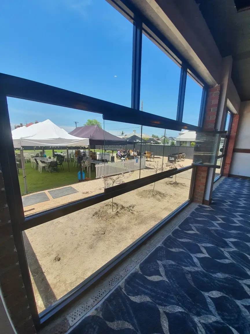 Balcony glazing installation at Yarraville Bowling Club, Melbourne