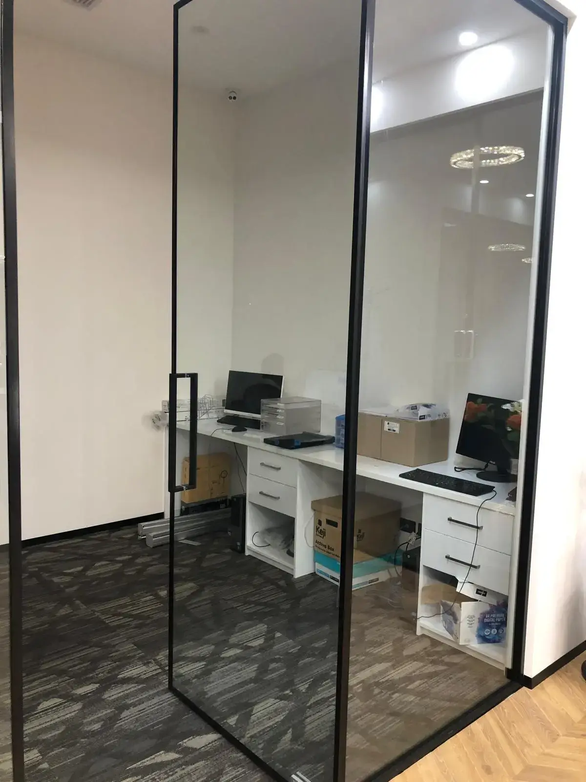Glass office partition installation