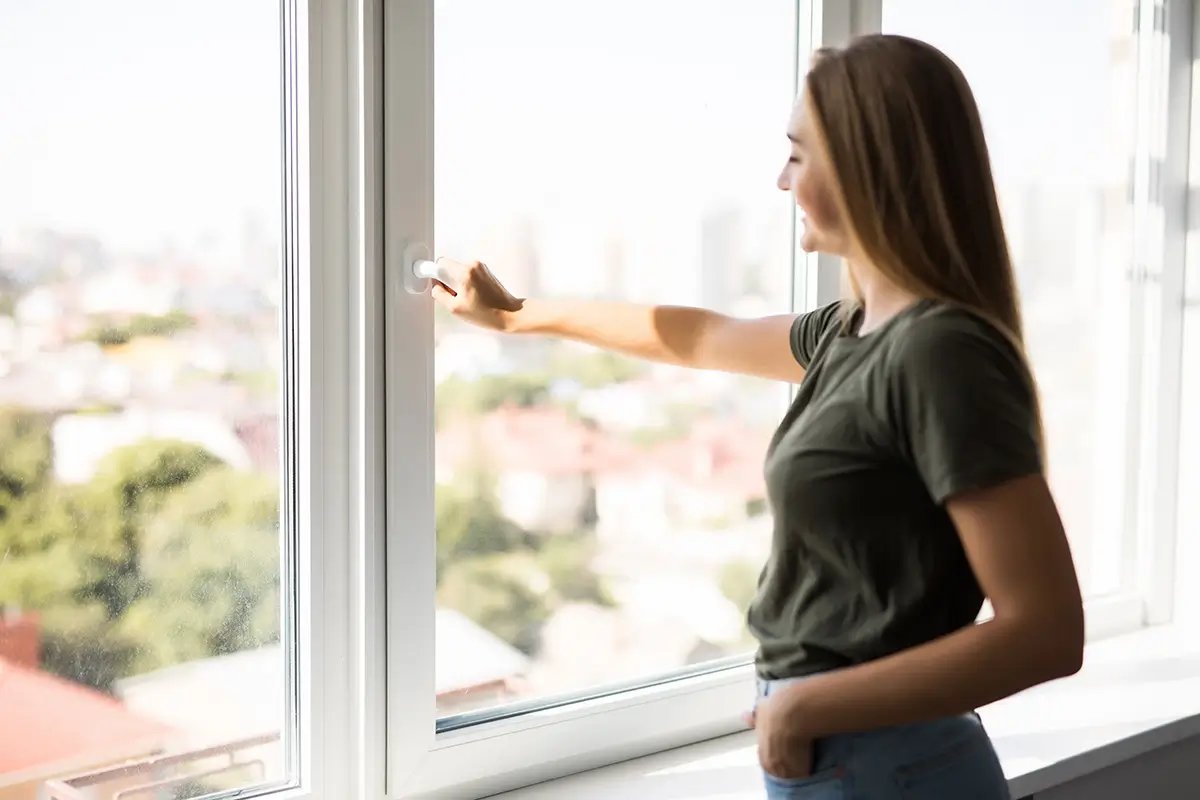 Homeowner reviewing a double glazing quote online